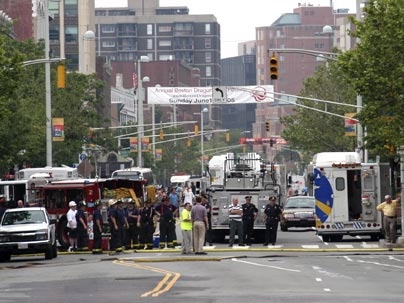 Emergency vehicles line Massachusetts Avenue during the afternoon Monday, June 13, after an Nstar equipment failure sparked an underground fire. By 5:30 p.m., the fire was out. No injuries were reported, but thousands lost power.