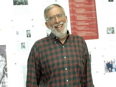 Dean of Science Robert J. Silbey poses in front of one of the bulletin boards that stood in the Stata Center on Friday, June 24, filled with his colleagues' reminiscences and good wishes.