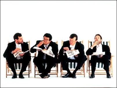 Members of the Endellion String Quartet enjoy fish and chips. They will perform a Mozart quintet at MIT this Friday with Professor Marcus Thompson.