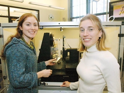 Graduate student Catherine Tweedie, left, and materials science and engineering Assistant Professor Krystyn Van Vliet, right, use a nanoindenter to measure the mechanical properties of biomaterials.