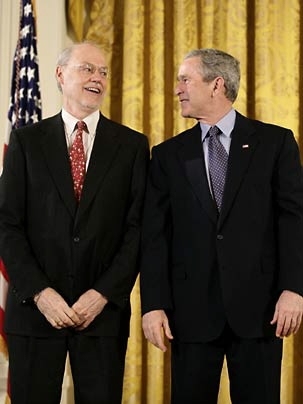 President George W. Bush congratulates MIT Institute Professor Phillip A. Sharp on receiving the National Medal of Science on Monday, Feb. 13, in the White House.
