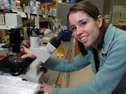 Graduate student Danielle France works in the lab where she and others examined the phenomenal power of the nano-spring, a fibrous coil grown by a single-cell protozoan.