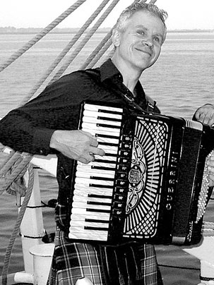 Tom Pixton, publishing advisor at MIT, will play the accordian at the Folk Arts Center of New England's New Year's Eve party.