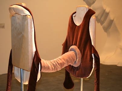 MIT graduate student Marisa Jahn designed a pair of vests joined by a bellows-like tube, which creates a sound. The garment will be featured at 'Seamless: Computational Couture,' a Feb. 1 fashion event curated by MIT Media Lab students. <a onclick="MM_openBrWindow('seam-jahn-2-enlarged.html','','width=509, height=583')">
<span onmouseover="this.className='cursorChange';">Open image gallery</span>...