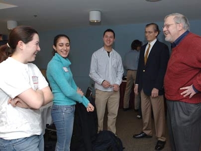 Freshmen Melissa Tanner and Julie Bharucha join sophomore Juan Prajogo, from left, in chatting with Class of 1959 alumni Alfredo Kniazzeh and David Packer at a luncheon held Tuesday, Jan. 24, in the Mezzanine Lounge of the Stratton Student Center.