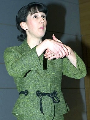 Jodi Smith of Mannersmith, an etiquette consulting firm, offers hand-shaking tips to students at the Undergraduate Practice Opportunities Program (UPOP) 'mocktail party' on Tuesday, Feb. 28.