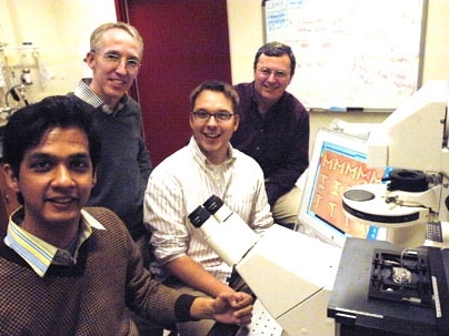 Graduate student Dhananjay Dendukuri, Professor Patrick Doyle, graduate student Daniel Pregibon and Professor Alan Hatton developed a new method for creating microparticles, shown on the monitor to the right.