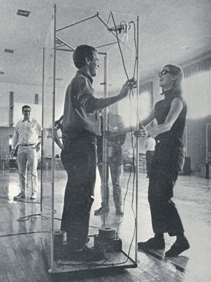 Image of Alex Hay and Lucinda Childs with ground effect machine at Berkeley Heights School rehearsals, from the MIT List Visual Arts Center's exhibition "9 Evenings Reconsidered: Art, Theatre, and Engineering, 1966."