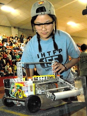 Sophomore Jean Chang readies her side-roller-ball-scooper machine for Wednesday's final rounds of 'IHTFP.'