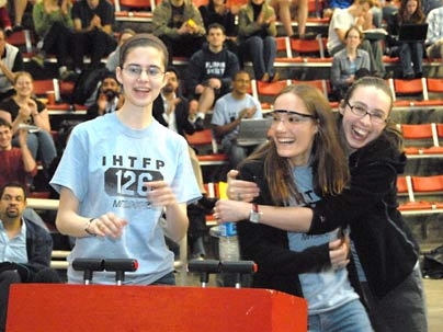 Abby Carey, a sophomore, celebrated a victorious round with sophomores Gina Angelosanto and Laura Martini. Carey built an extendo-arm-of-doom machine.