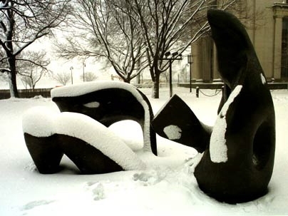 Henry Moore's sculpture, 'Three-Piece Reclining Figure,' is publicly accessible on Killian Court.