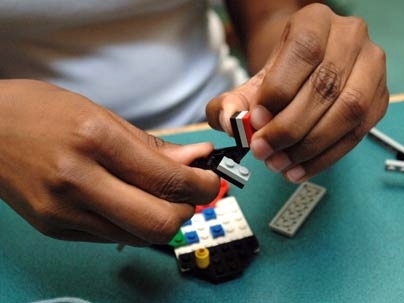 A You Go Girl! participant works on her Lego fish on Aug. 2.