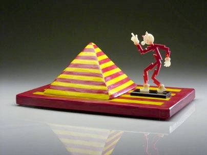 Reddy Kilowatt, right, a glass sculpture by Richard Marquis, combines classical and contemporary glass techniques then adds a good dose of whimsy.