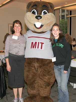 Tim the Beaver welcomes Carol McKenna, left, and her daughter, Claire, an MIT senior, during Family Weekend.