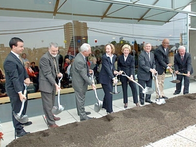 President of Simmons Hall Andrew Lukmann, a senior in civil and environmental engineering; Dean for Student Life Larry Benedict; Interim Executive Vice President Sherwin Greenblatt; MIT President Susan Hockfield; donors Ginny and Richard Simmons; Cambridge Mayor Kenneth Reeves; and City Manager Robert Healy lift their shovels to mark groundbreaking on Vassar Street in front of Simmons Hall.