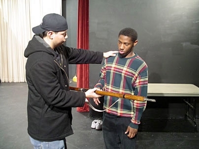 In "Roommates," by graduate student Hubert Pham, an introvert adjusts to his gun-toting, dog-owning, partnered new roommate. Director Ashley Micks focuses on the one-act play's subtle humor and its unsettling 'dissonant chord.'