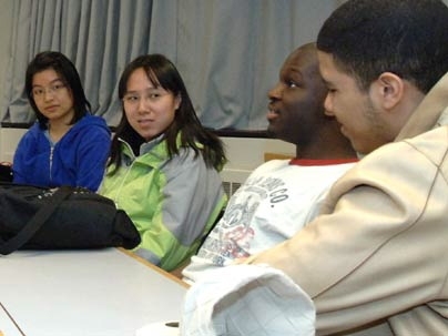 MIT students discuss issues of race and tolerance while making plans for a creative installation in honor of Martin Luther King Jr. From left are sophomore Poting Cheung, juniors Jenny Man and Christopher Chapman and sophomore Ricky Burgess.