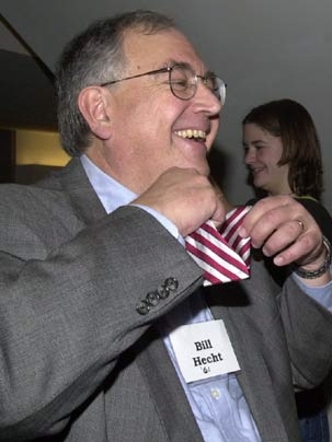 Bill Hecht, then the executive vice president of the Alumni Association, demonstrates the proper way to tie a bowtie during MIT Charm School in 2002.