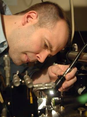 Postdoc Peter Rakich worked with MIT colleagues to develp a novel way to add the power and speed of light waves to traditional electronics.