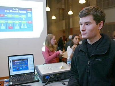 Zachary LaBry, a junior in aeronautics and astronautics, listens to information on a student-led effort to bring biodiesel to campus at the second Re-Generator event on energy initiatives.