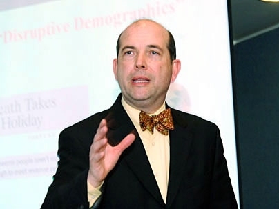 Joseph F. Coughlin, founder and director of the MIT AgeLab, explains how older adults are the leading adopters of new technology during a lecture on Feb. 26.