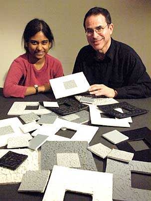 Professor Edward Adelson, right, and his MIT co-author Lavanya Sharan with some of the "surfaces" they use to measure subjects descriptions of their perception of texture,glossiness, etc. in the lab.