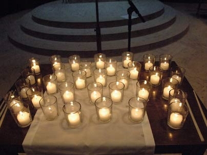 At an interfaith service in commemoration of the victims of the Virginia Tech shootings, 33 candles were lit to represent each of those who died. The ceremony, held April 18, was organized by MIT's chaplains.
