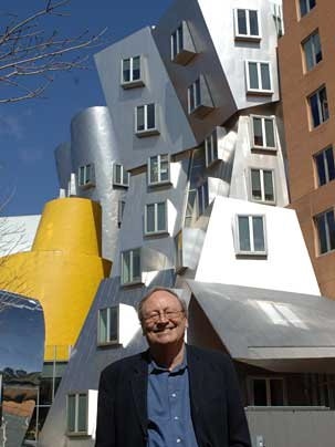 Mitchell stands in front of the Ray and Maria Stata Center, one of several buildings in his new book "Imagining MIT," which reveals the process behind designing and building some of MITs most innovative architectural projects.