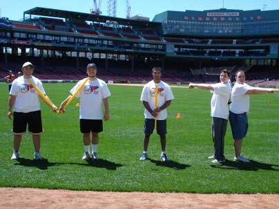 MIT students spell out their alma mater's initials in the Fenway Park outfield. Students Jonathan Schechter (left), Shawn Sullivan, Naveen Krishnan, Jeff Hoff and Larry Colagiovanni were there for the "Wiffle Your Way to Fenway" championship.