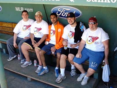 The Kappa Sigma fraternity brothers try out the Fenway dugout. From left: Jeff Hoff, Jonathan Schechter, Shawn Sullivan, Naveen Krishnan, and Larry Colagiovanni.