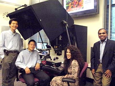 From left, research scientists Ming Dao and Kuangshin Tai, Ph.D, Professor Christine Ortiz, and Professor Subra Suresh with equipment they used to investigate bone structure.