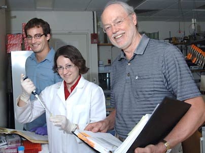MIT post-doc Joel Neilson, left, graduate student Margaret Ebert and Institute Professor Phillip Sharp have developed a new technique to study the function of microRNA that could shed light on the genetic material's hypothesized role in cancer.
