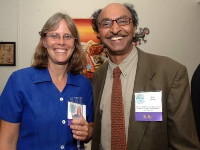 Amy Smith, senior lecturer at the Edgerton Center, and Professor Bish Sanyal of urban studies and planning are all smiles at the opening of iHouse on Tuesday night. The two co-teach D-Lab, a course in which students collaborate with local citizens to solve problems in developing countries.