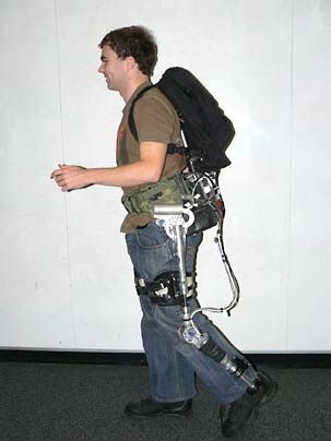 Graduate student Conor Walsh demonstrates a prototype of the 'exoskeleton' he and other MIT researchers have devised. The invention can successfully take on 80 percent of an 80-pound load carried on a person's back.