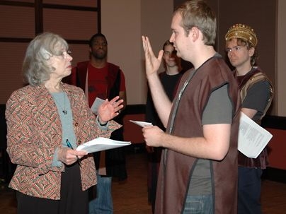 Sloan senior lecturer Christine Kelly, left, explains the finer points of Shakespeare to Vadim Skaletsky as fellow students Taariq Lewis, John Angelos and Gregor Hanuschak look on.