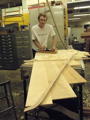 Sophomore Zachary Bjornson painstakingly shapes the body of his harpsichord.