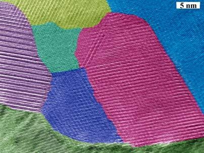 A cross-section of nano-crystalline bismuth antimony telluride grains, as viewed through transmission electron microscope. Colors highlight the features of each grain of the semiconductor alloy in bulk form. A team of researchers from Boston College and MIT produced a major increase in thermoelectric efficiency after using nanotechnology to structure the material, which is commonly used in industr...