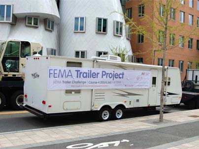 A FEMA trailer en route to the MIT campus, where it will form the centerpiece of a new course on research as artistic practice.