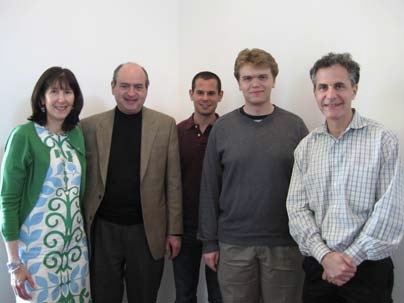 From left to right, Holly Housman and Charles Housman stand with Housman Awardees Aaron Tievsky, Denis Chebikin and Mathematics Department Head Michael Sipser.