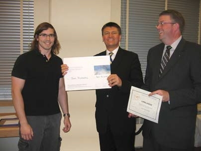 Lufhansa Prize 1st place winner Jason Bryslawskyj stands with Christoph Fay and Marius Carstensen, both of Lufthansa.