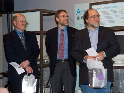 EECS Senior Lecturer Christopher Terman, left, and Professor Ronald Rivest both recipients of the Jamieson Prize in EECS listen with Associate Dept. Head Duane Boning to Burgess Jamieson speak on handing out the awards.