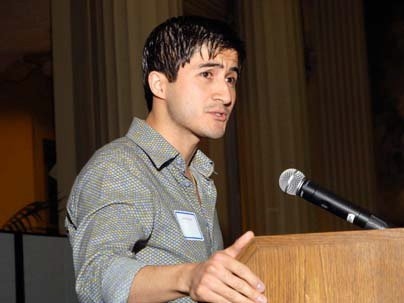 At the Department of Civil and Environmental Engineering awards dinner, graduate student Jose Alberto Ortega accepts the Maseeh Award for excellence as a teaching assistant. The graduate student from Cuenca, Ecuador, was nominated by the faculty and students he assisted in 1.050 Engineering Mechanics I. PHOTO / Laura Wulf