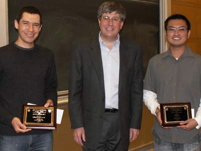 Edward W. Merrill Outstanding TA Award winner Patrico Ramirez Munoz and Jit Hin Tan with Department Head Klavs Jensen.