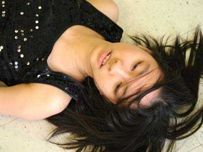 HuiYing Wen as Rosemary in 'Demolition Downtown' by Tennessee Williams, the Dramashop production directed by Jay Scheib April 21-23 and 28-30, 2005. She received a 2008 Joseph D. Everingham Award, which recognizes a single creative outstanding performance or notable creative accomplishments in theater arts by a graduating senior.