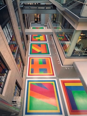 Sol LeWitt's 'Bars of Color within Squares,' located in the Green Center for Physics, with Building 6C to the right.