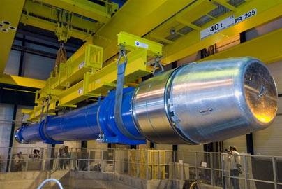 A ceremony is held as the last of 1746 superconducting magnets is lowered into the 27-km circumference tunnel that houses the LHC.