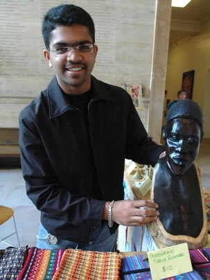 D-Lab student Raja Bobbili, a junior in electrical engineering, manned the crafts sale in Lobby 10 on Sept. 29, 2005, as part of MIT's International Development Forum. Students in MIT's D-Lab, a series of courses that focus on international development, bring back crafts from course field trips to Haiti, Honduras and other developing countries, sell them locally and send the proceeds back to the a...
