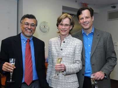 Head of the Department of Brain and Cognitive Sciences and the Paul E  Newton (1965) Professor of Neuroscience  Mriganka Sur, left, led a toast to newly named Institute Professor Ann Graybiel, along with Robert Desimone, director of the McGovern Institute, at a party given in Graybiel's honor.
