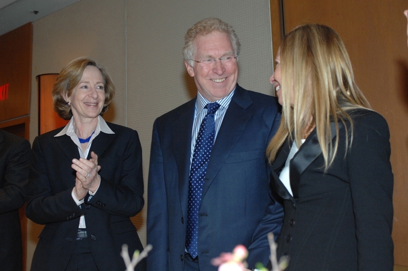 President Susan Hockfield applauds Phillip (Terry) and Susan Ragon during the announcement of the Phillip T. and Susan M. Ragon Institute, a collaboration between MIT, MGH and Harvard that aims to develop a vaccine for AIDS.