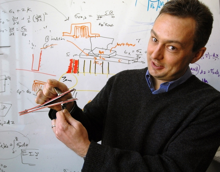 Brian Wardle, the Charles Stark Draper Assistant Professor in the Department of Aeronautics and Astronautics, shows an advanced composite material held together by "nanostitching," a technique developed at MIT thatÂ could make airplane skins and other products stronger.